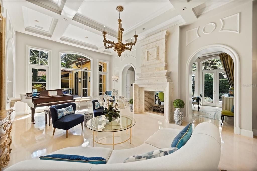 Chandelier, Fireplace, Interior, Living room, Piano, Recessed Lighting