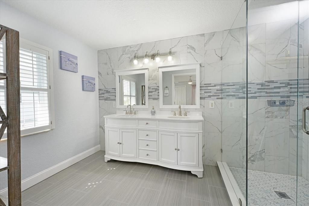 Bathroom, Dual Sink Vanities, Glass Shower, Interior, Marble Walls