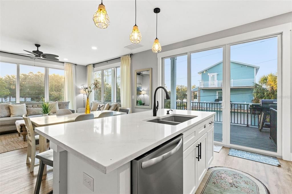 Dining room, Interior, Kitchen, Living room, Pendant Lights, Recessed Lighting, Stainless Steel Appliances, Wood Texture Flooring