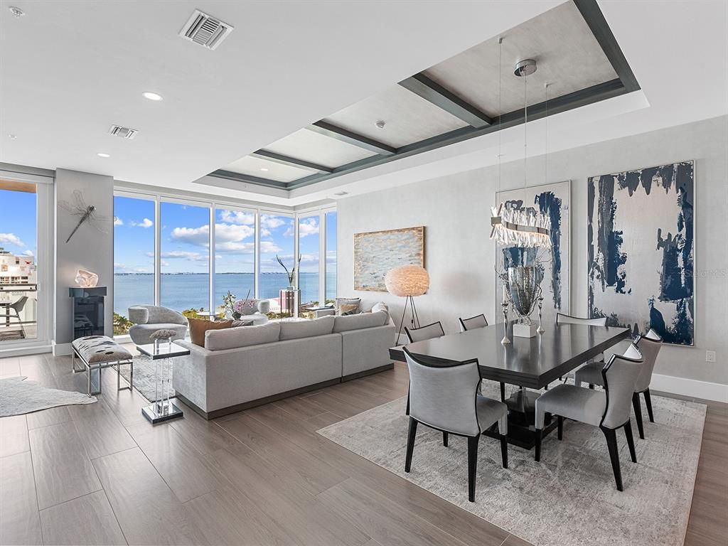 Dining room, Fireplace, Interior, Living room, Pendant Lights, Recessed Lighting, Water, Wood Texture Flooring