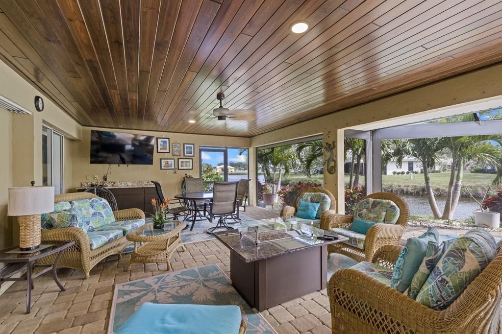 Dining room, Interior, Living room, Recessed Lighting, Sun Room, Water, Wooden Ceilings