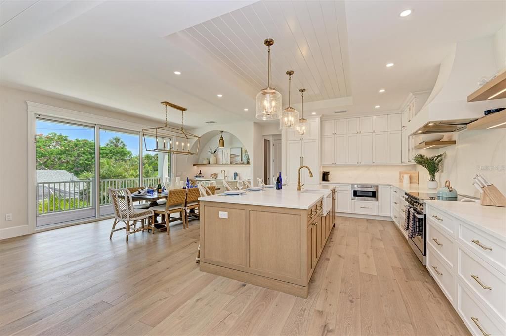 Dining room, Interior, Kitchen, Pendant Lights, Recessed Lighting, Stainless Steel Appliances, Wood Texture Flooring