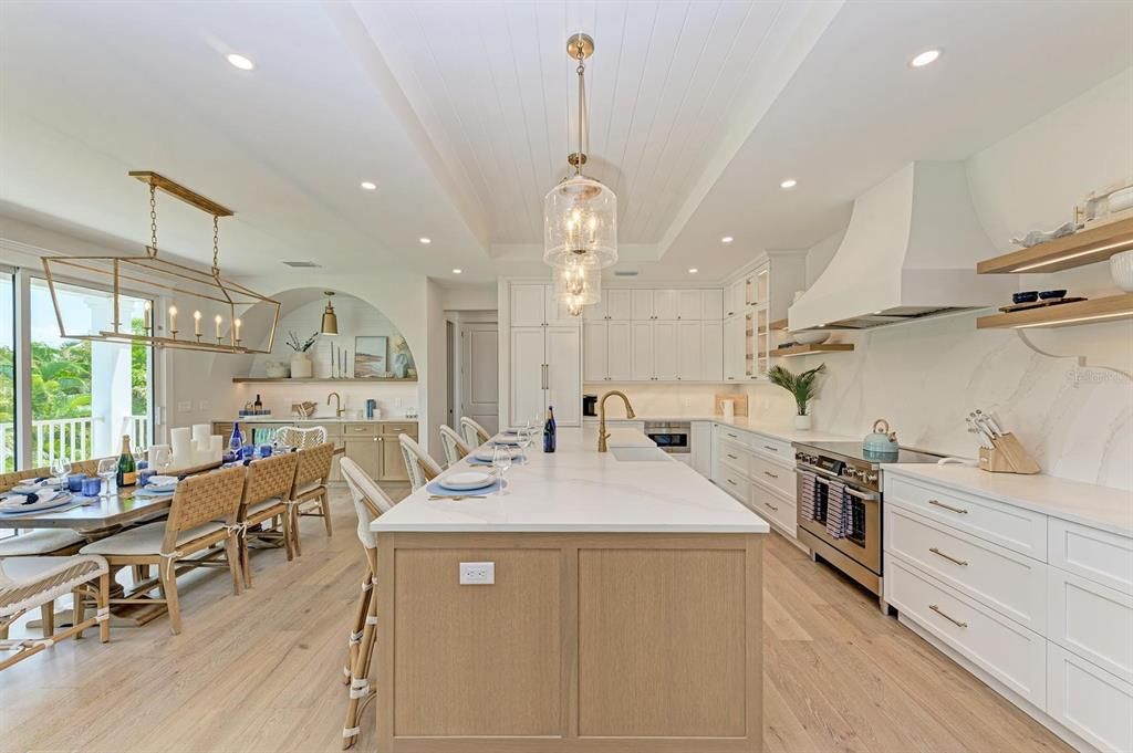 Chandelier, Dining room, Interior, Kitchen, Pendant Lights, Recessed Lighting, Stainless Steel Appliances, Wood Texture Flooring