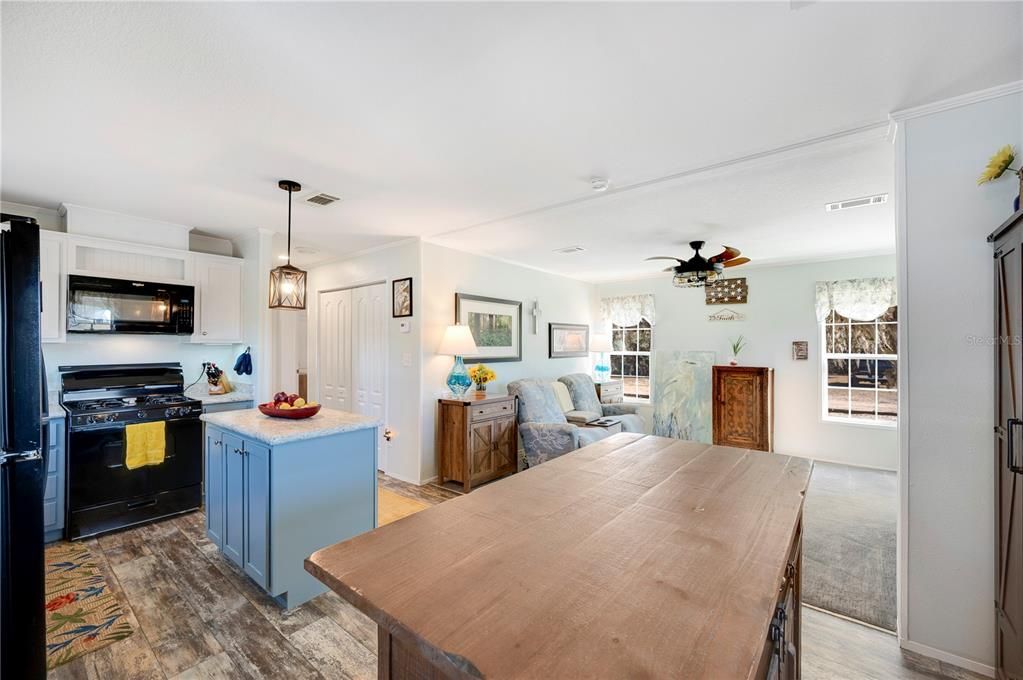 Dining room, Interior, Kitchen, Pendant Lights, Stainless Steel Appliances, Wood Texture Flooring