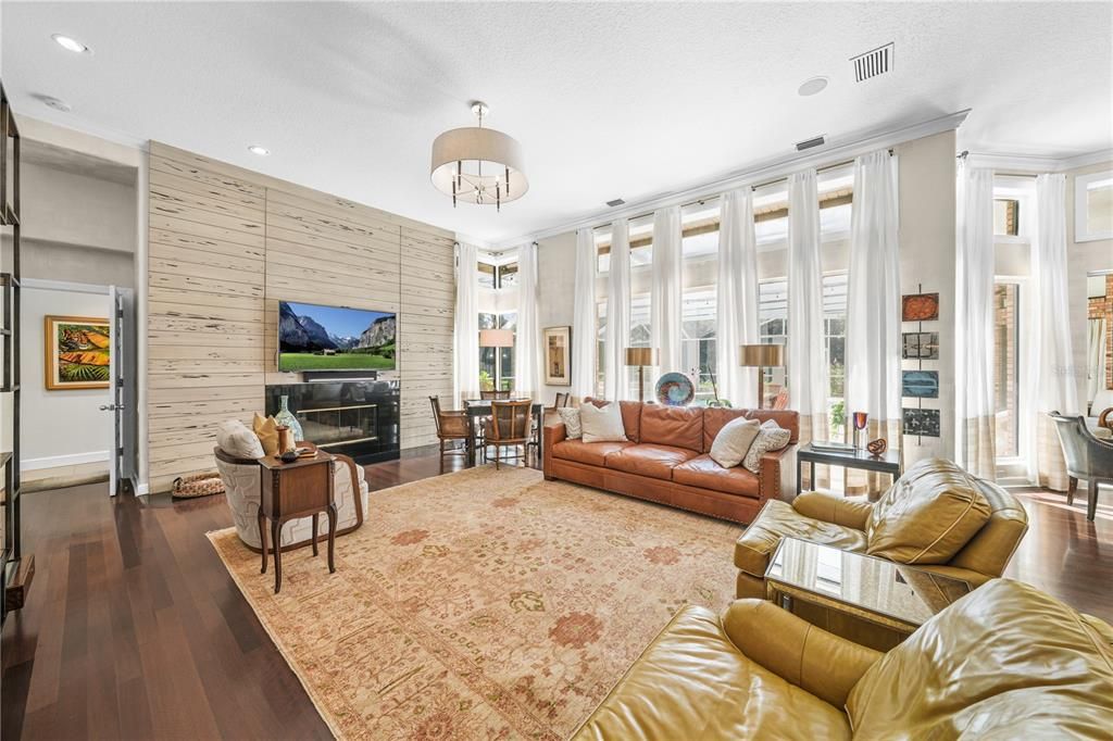 Fireplace, Interior, Living room, Recessed Lighting, Stone Walls, Wood Texture Flooring