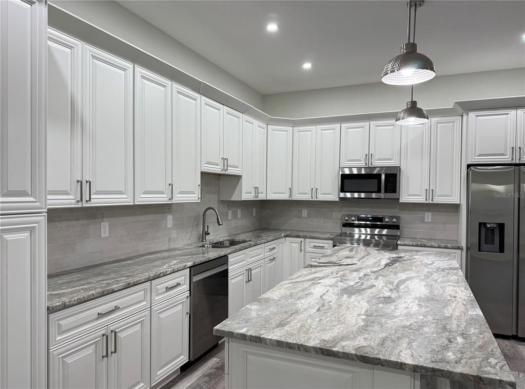 Interior, Kitchen, Pendant Lights, Recessed Lighting, Stainless Steel Appliances, Wood Texture Flooring