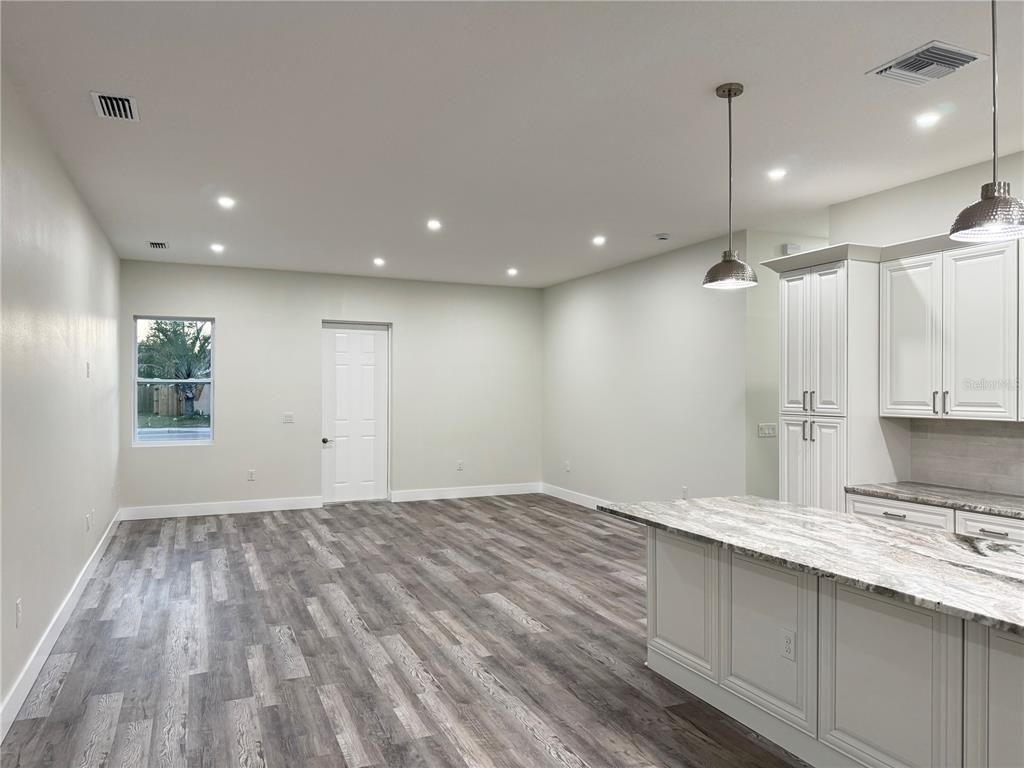 Empty room, Interior, Kitchen, Pendant Lights, Recessed Lighting, Wood Texture Flooring