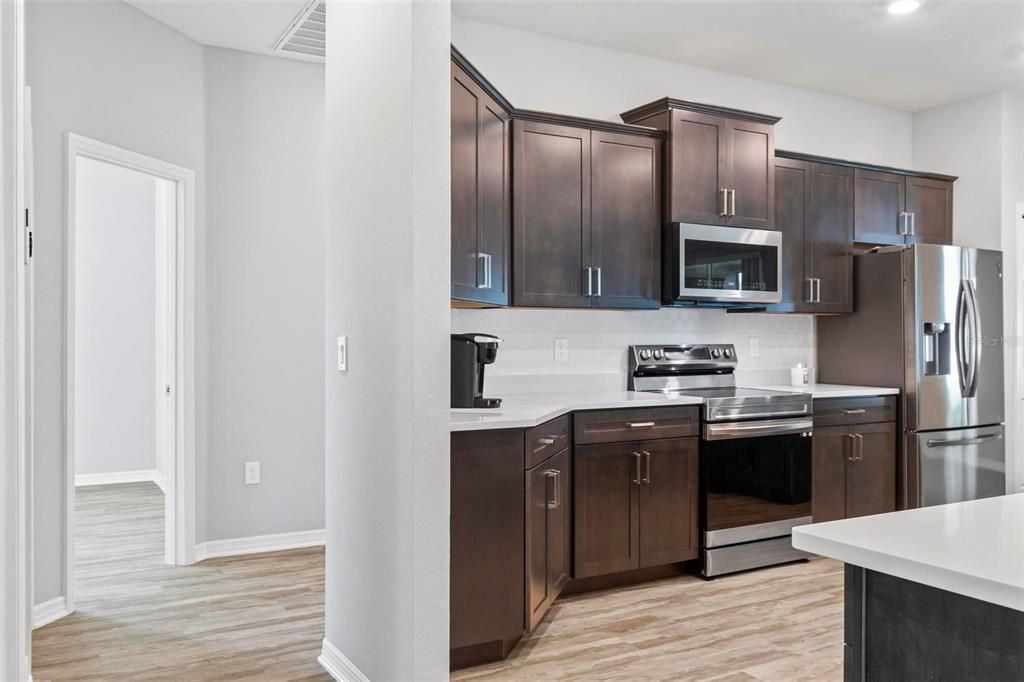 Interior, Kitchen, Recessed Lighting, Stainless Steel Appliances, Wood Texture Flooring