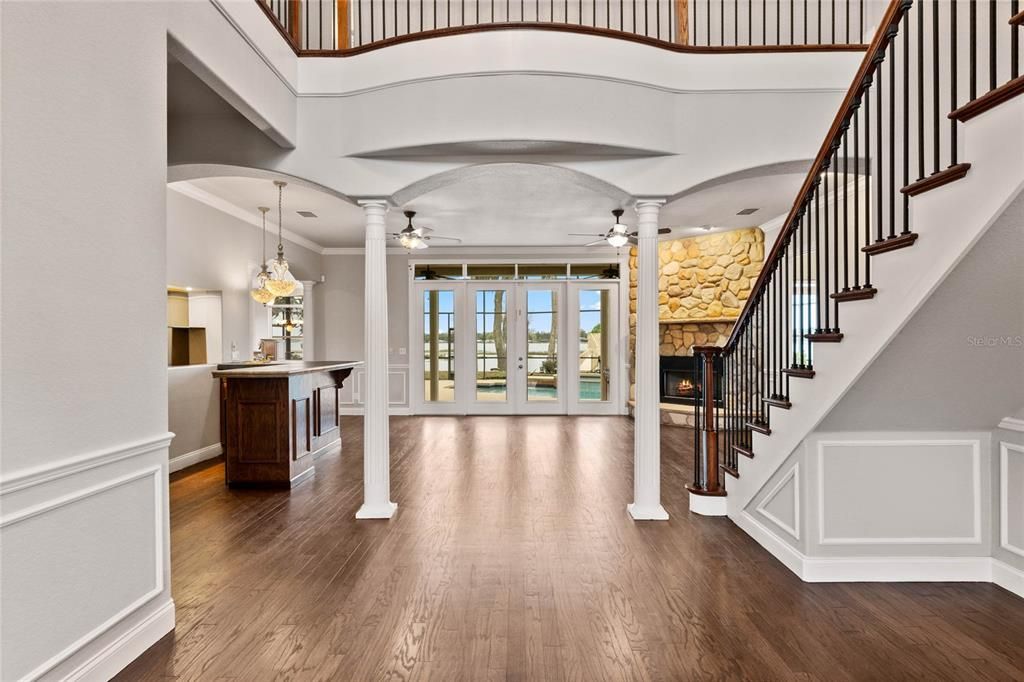 Chandelier, Fireplace, Interior, Pendant Lights, Stone Walls, Wood Texture Flooring