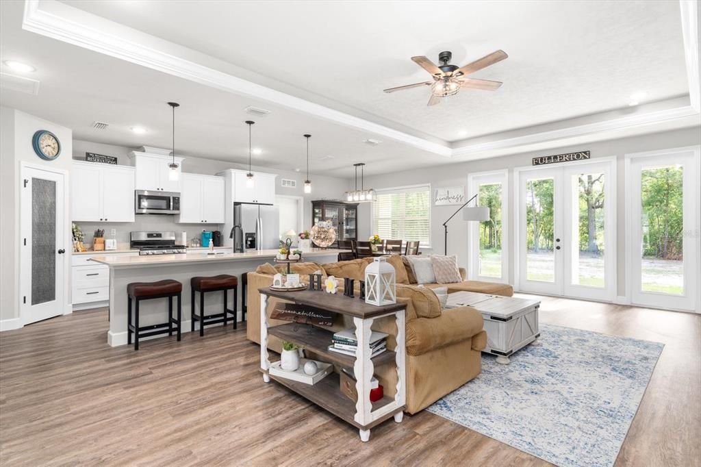 Dining room, Interior, Kitchen, Living room, Pendant Lights, Recessed Lighting, Stainless Steel Appliances, Wood Texture Flooring