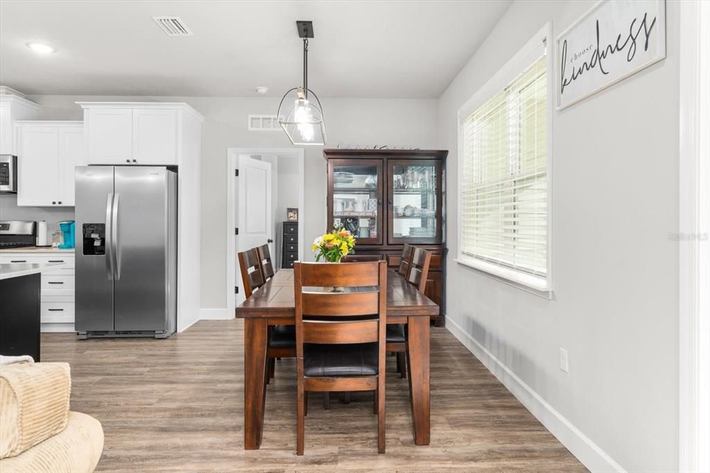 Dining room, Interior, Kitchen, Pendant Lights, Recessed Lighting, Stainless Steel Appliances, Wood Texture Flooring