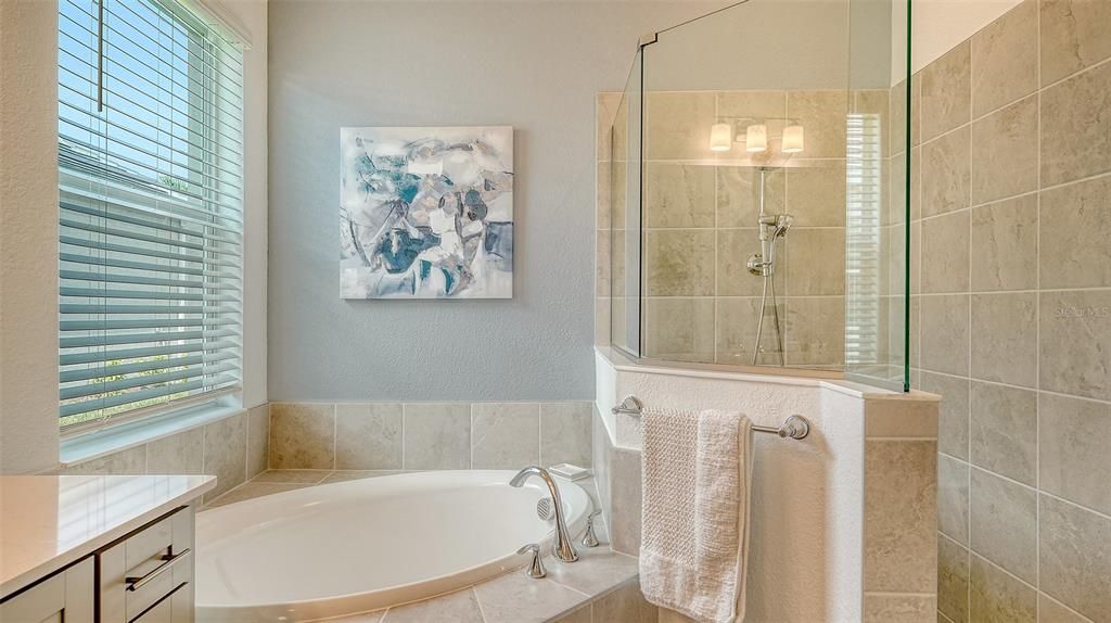 Bathroom, Dual Sink Vanities, Glass Shower, Interior, Recessed Lighting, Wood Texture Flooring