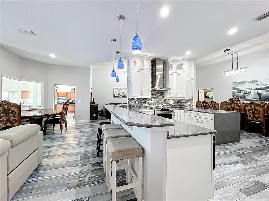 Dining room, Interior, Kitchen, Living room, Pendant Lights, Recessed Lighting, Wood Texture Flooring
