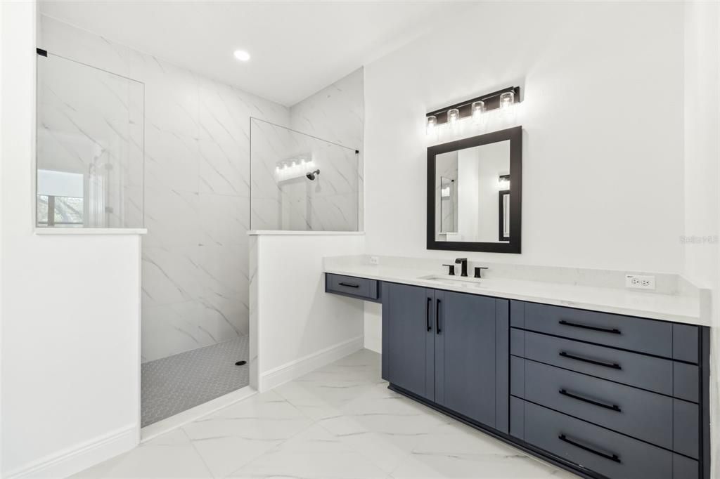 Bathroom, Dual Sink Vanities, Interior, Marble, Marble Walls, Recessed Lighting
