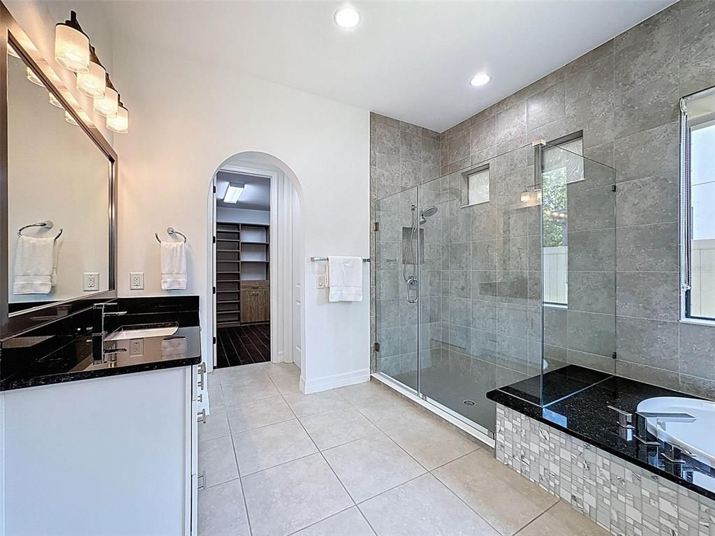 Bathroom, Dual Sink Vanities, Glass Shower, Interior, Recessed Lighting, Wood Texture Flooring