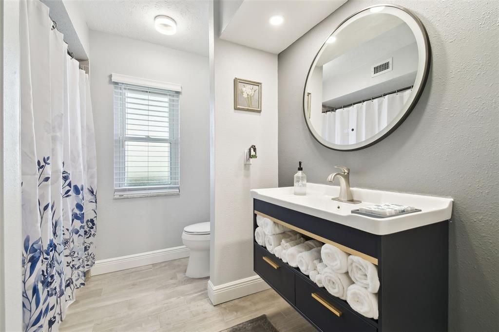Bathroom, Dual Sink Vanities, Interior, Recessed Lighting, Wood Texture Flooring