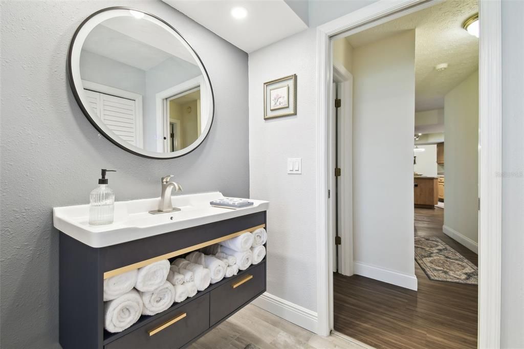 Bathroom, Dual Sink Vanities, Interior, Recessed Lighting, Wood Texture Flooring