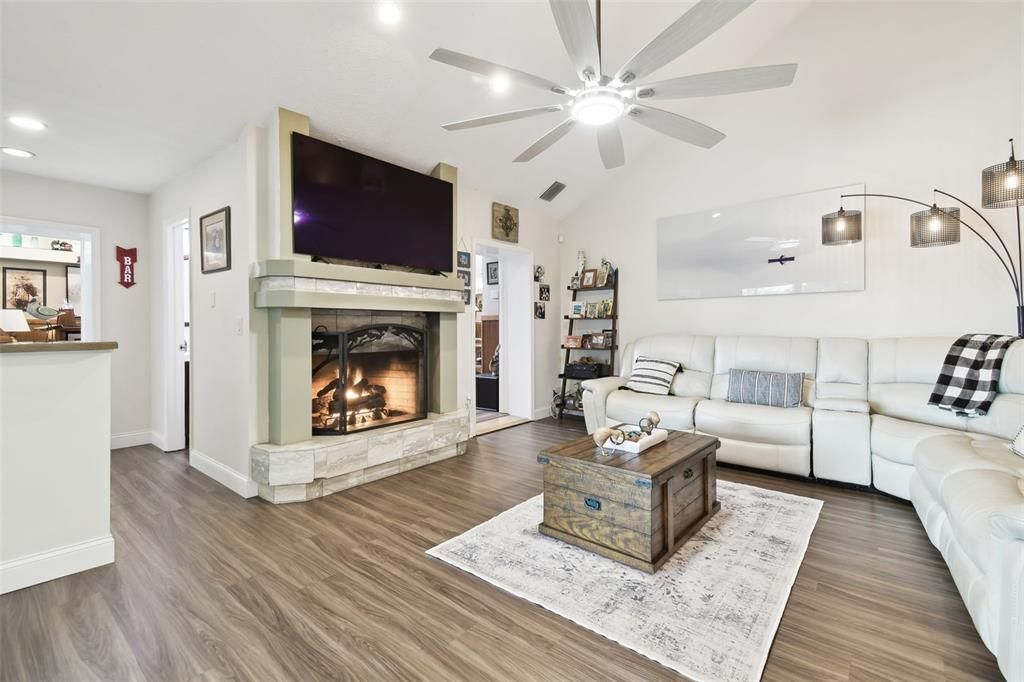 Fireplace, Interior, Living room, Recessed Lighting, Wood Texture Flooring