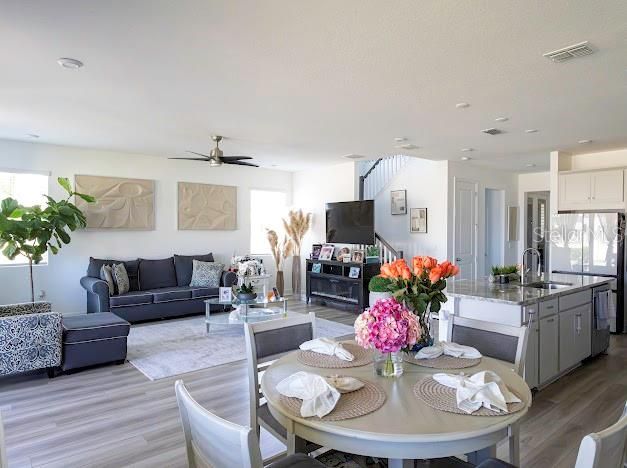 Dining room, Interior, Kitchen, Living room, Recessed Lighting, Stainless Steel Appliances, Wood Texture Flooring