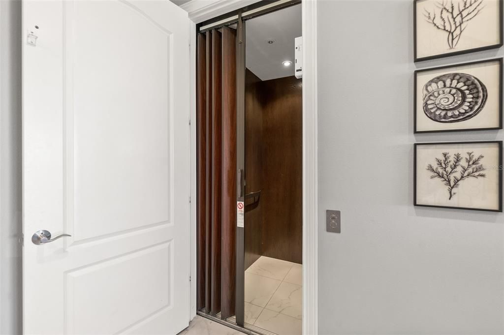 Elevator, Interior, Marble, Recessed Lighting, Wooden Walls