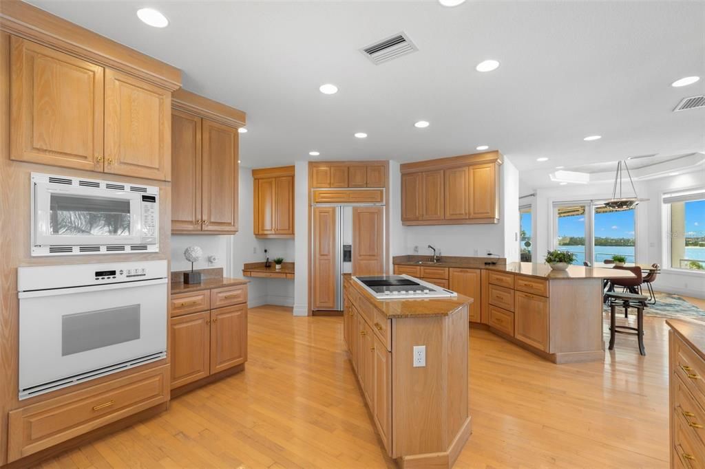 Dining room, Interior, Kitchen, Pendant Lights, Recessed Lighting, Water, Wood Texture Flooring