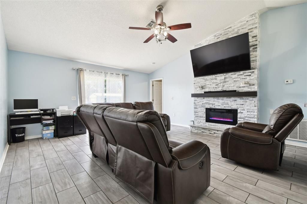 Home Theatre Room, Fireplace, Interior, Living room, Stone Walls, Wood Texture Flooring