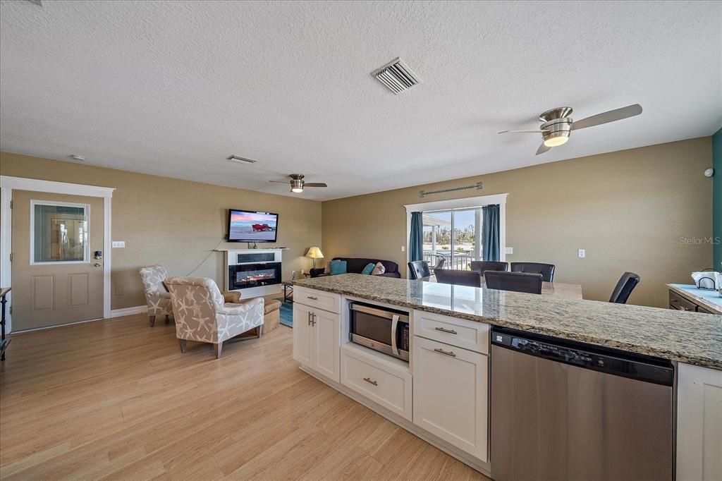 Dining room, Fireplace, Interior, Kitchen, Living room, Wood Texture Flooring