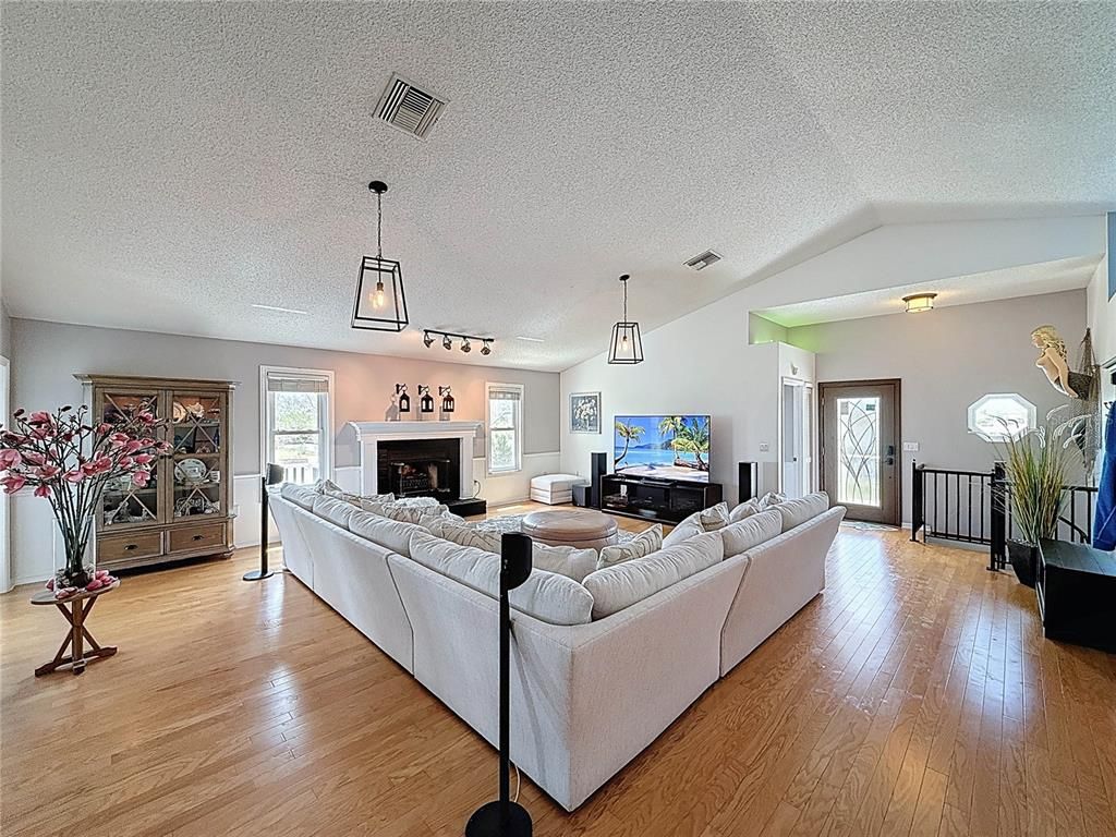 Fireplace, Interior, Living room, Pendant Lights, Wood Texture Flooring
