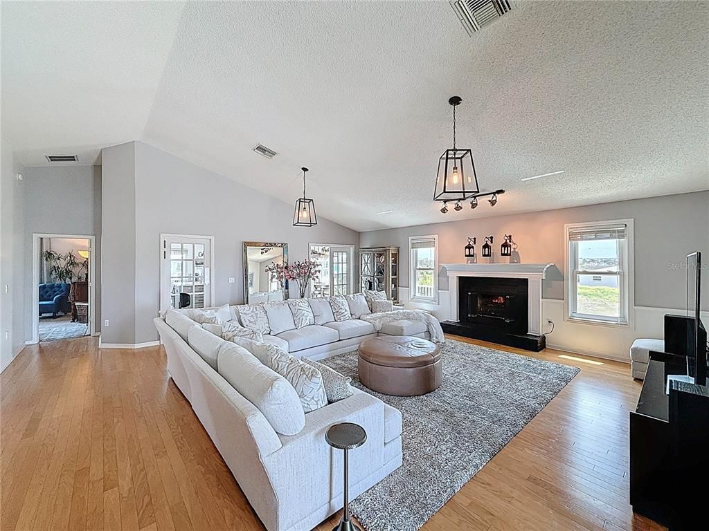 Fireplace, Interior, Living room, Pendant Lights, Wood Texture Flooring
