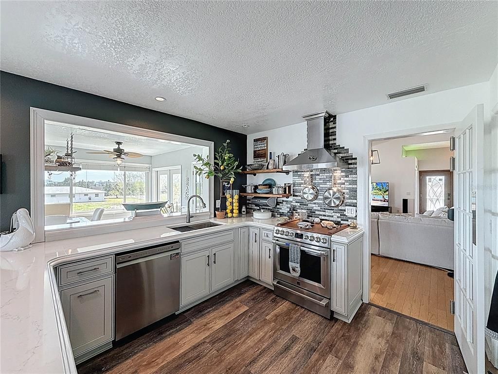Interior, Kitchen, Recessed Lighting, Stainless Steel Appliances, Stone Walls, Wood Texture Flooring