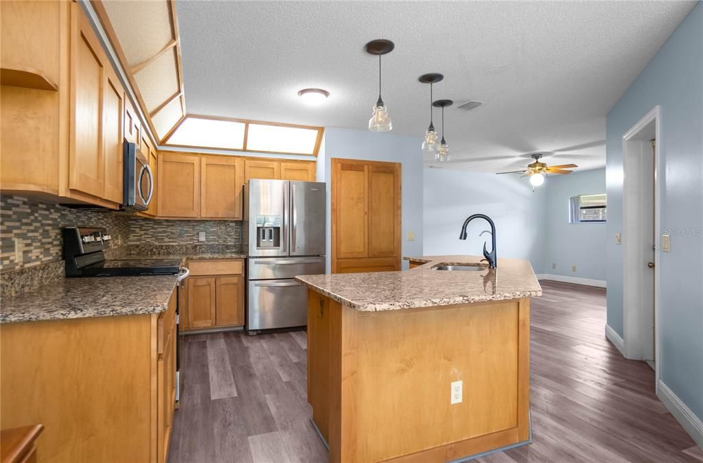 Interior, Kitchen, Pendant Lights, Stainless Steel Appliances, Wood Texture Flooring