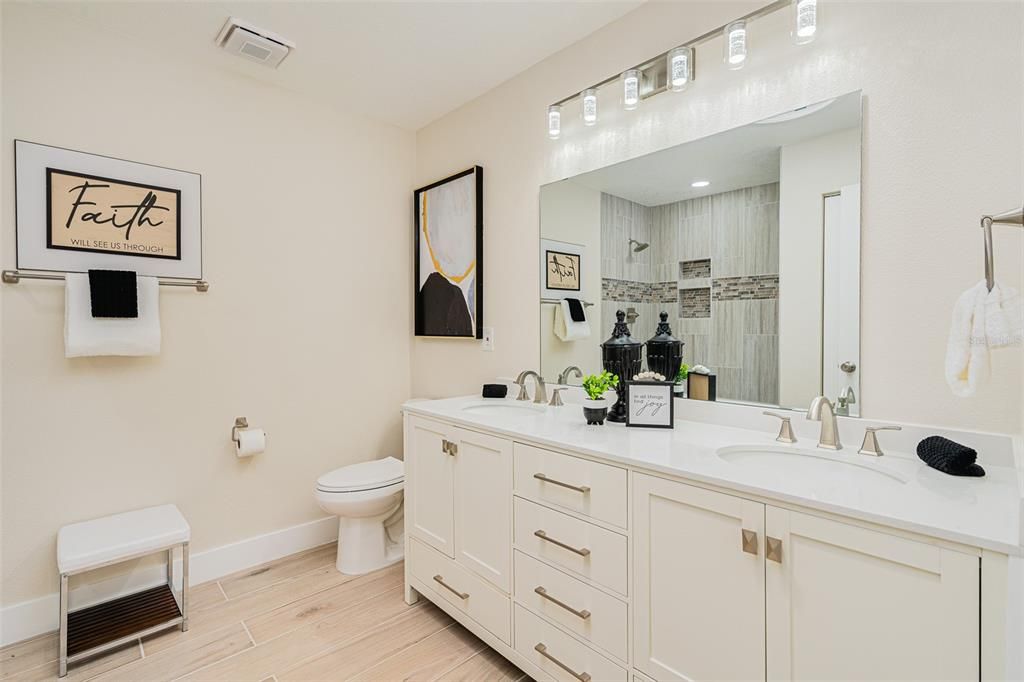 Bathroom, Dual Sink Vanities, Interior, Recessed Lighting, Wood Texture Flooring