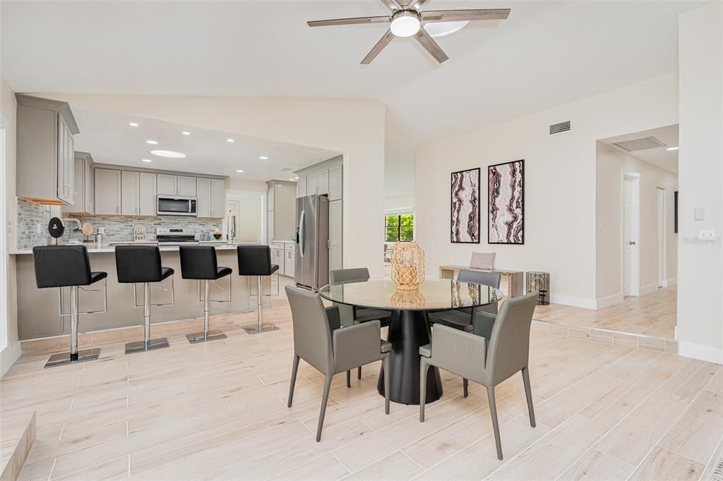 Dining room, Interior, Kitchen, Recessed Lighting, Stainless Steel Appliances, Wood Texture Flooring