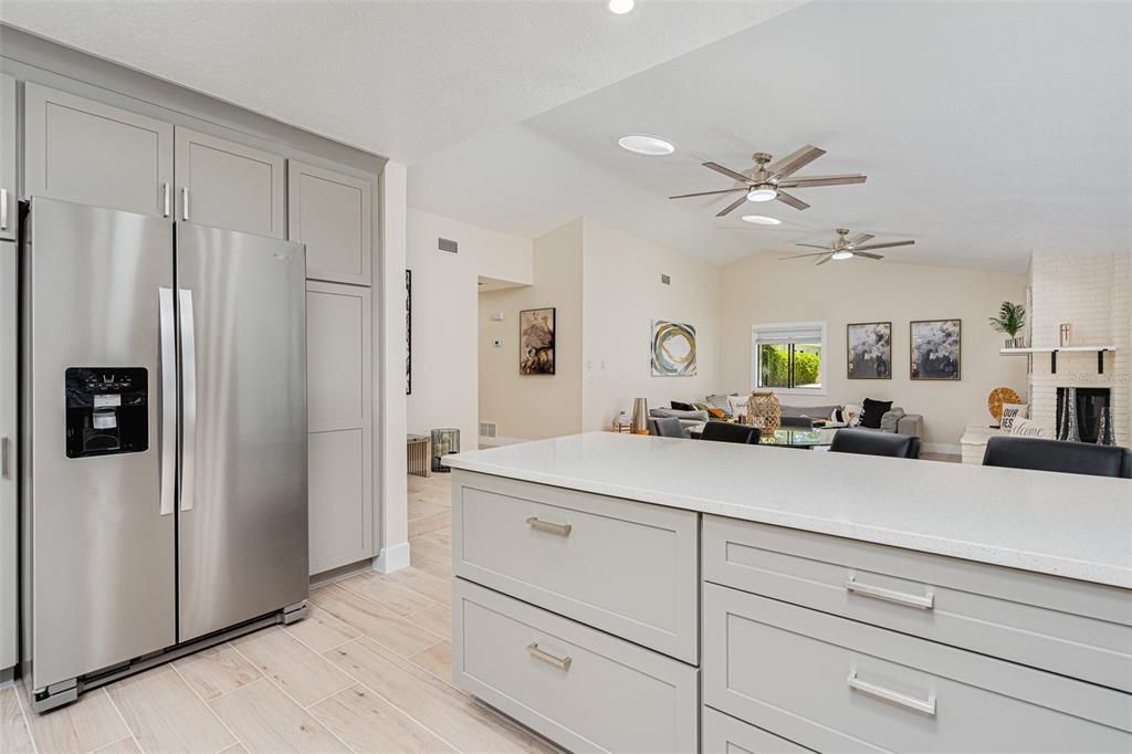 Dining room, Interior, Kitchen, Recessed Lighting, Stainless Steel Appliances, Wood Texture Flooring