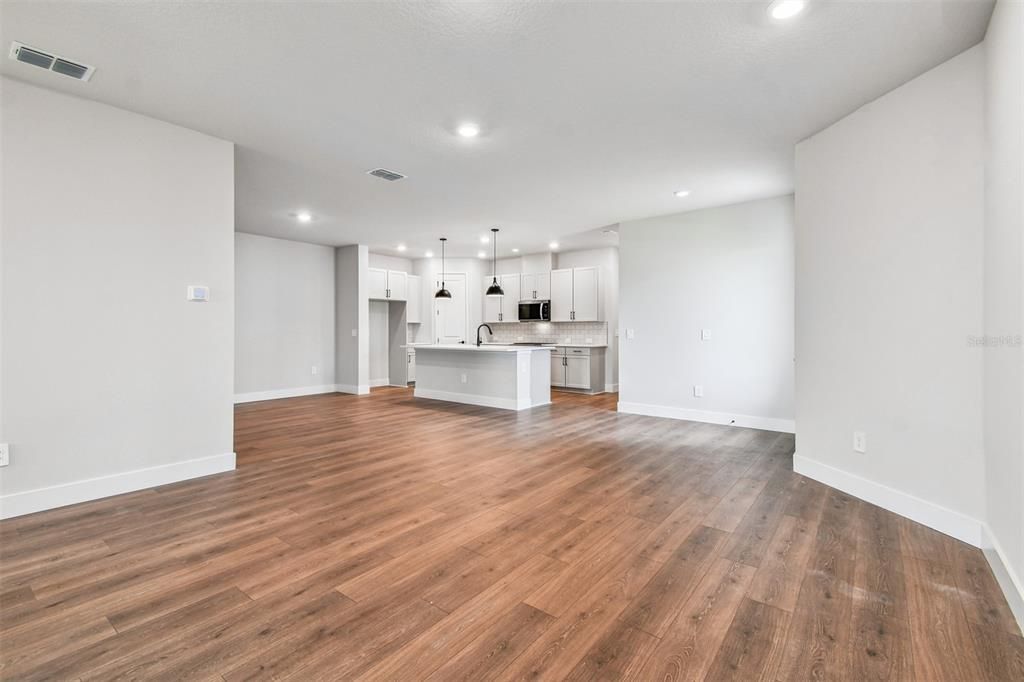 Empty room, Interior, Kitchen, Pendant Lights, Recessed Lighting, Wood Texture Flooring