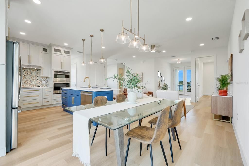 Dining room, Interior, Kitchen, Pendant Lights, Recessed Lighting, Stainless Steel Appliances, Wood Texture Flooring
