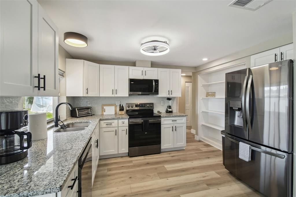 Interior, Kitchen, Recessed Lighting, Stainless Steel Appliances, Wood Texture Flooring