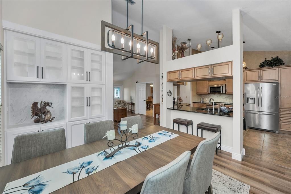 Dining room, Interior, Kitchen, Pendant Lights, Stainless Steel Appliances, Wood Texture Flooring
