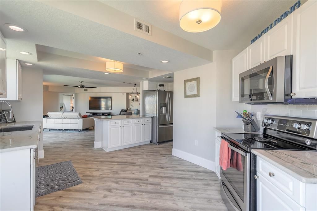 Interior, Kitchen, Living room, Pendant Lights, Recessed Lighting, Stainless Steel Appliances, Wood Texture Flooring