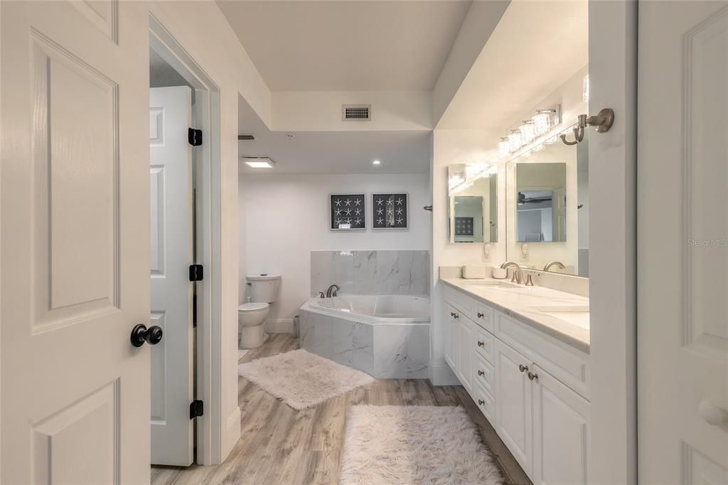 Bathroom, Dual Sink Vanities, Interior, Recessed Lighting, Wood Texture Flooring