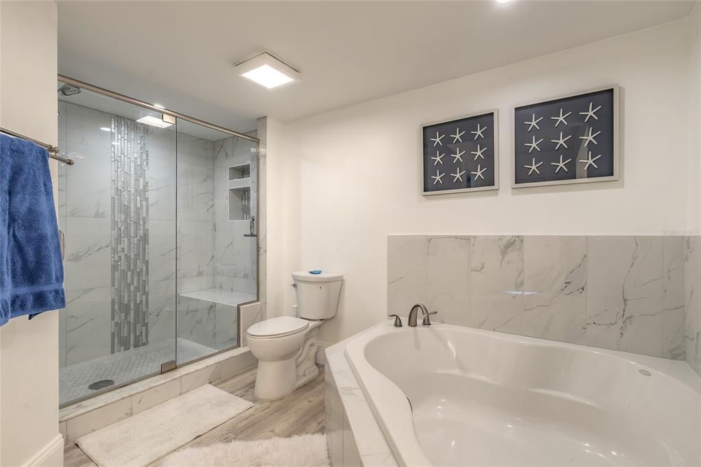 Bathroom, Glass Shower, Interior, Marble Walls, Wood Texture Flooring