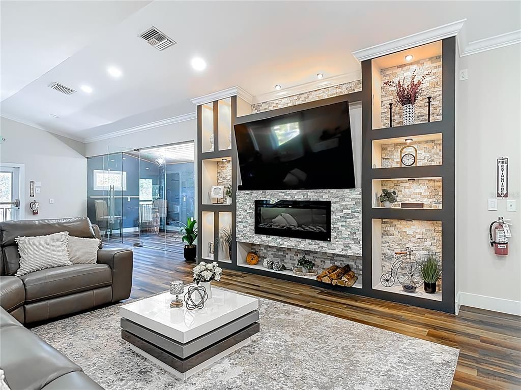 Fireplace, Interior, Living room, Recessed Lighting, Wood Texture Flooring