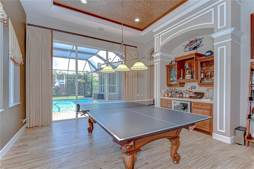 Game Room, Glass Ceilings, Interior, Pendant Lights, Recessed Lighting, Sun Room, Wood Texture Flooring