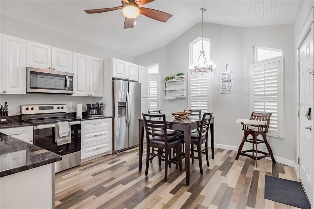 Dining room, Interior, Kitchen, Pendant Lights, Stainless Steel Appliances, Wood Texture Flooring