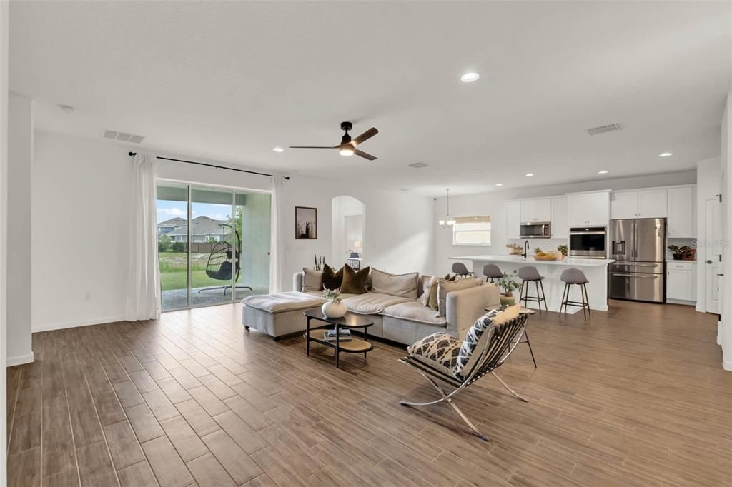 Dining room, Interior, Kitchen, Living room, Pendant Lights, Recessed Lighting, Stainless Steel Appliances, Wood Texture Flooring