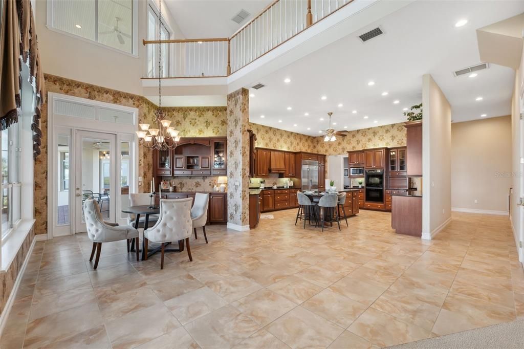 Chandelier, Dining room, Interior, Kitchen, Pendant Lights, Recessed Lighting, Stainless Steel Appliances