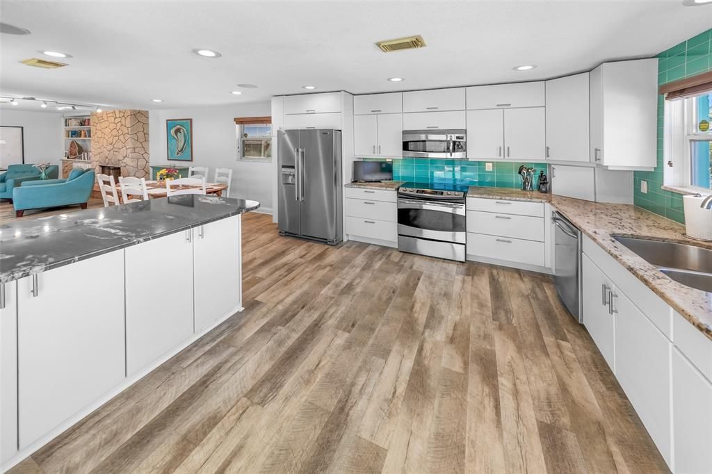 Interior, Kitchen, Recessed Lighting, Stainless Steel Appliances, Stone Walls, Wood Texture Flooring