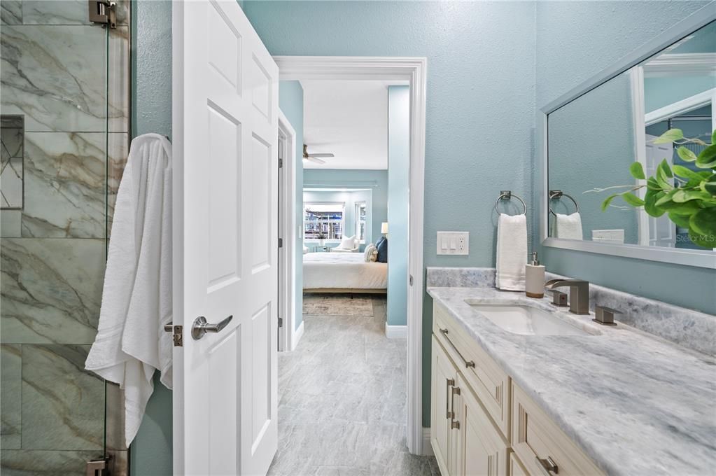 Bathroom, Bedroom, Dual Sink Vanities, Glass Shower, Interior, Marble, Marble Walls, Wood Texture Flooring