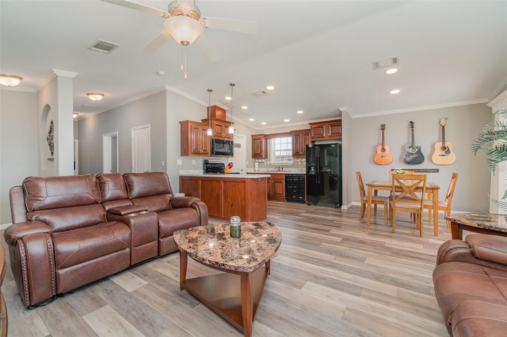 Dining room, Interior, Kitchen, Living room, Pendant Lights, Recessed Lighting, Stainless Steel Appliances, Wood Texture Flooring