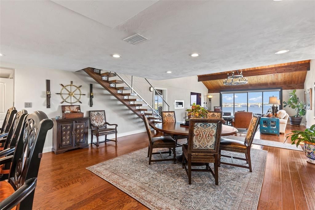 Dining room, Interior, Pendant Lights, Piano, Recessed Lighting, Wood Texture Flooring